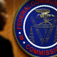 A photo shows the seal of the Federal Communications Commission before a meeting in Washington.